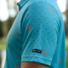 CA Statement Golf Shirt | Teal & Orange - Image 3